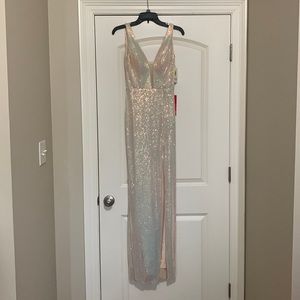 Iridescent sequin prom long dress. Never worn new with tags. Looks stunning on.